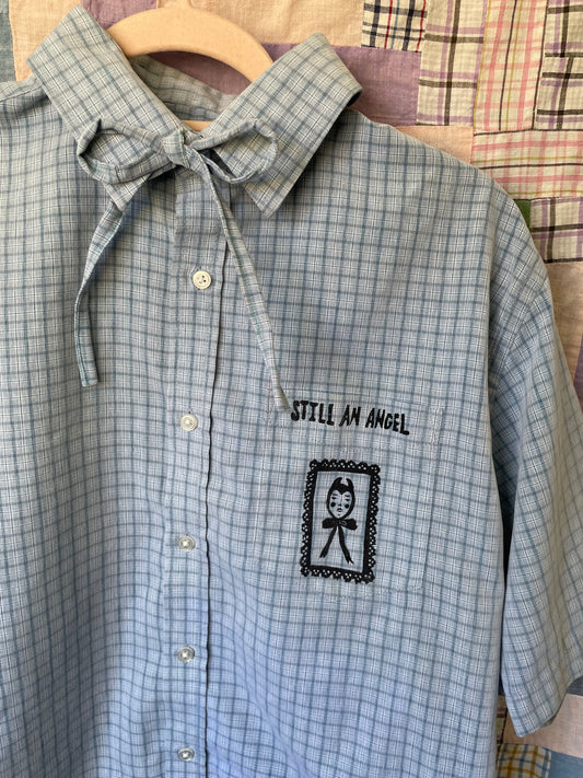 "Still An Angel" Block Print Button Down - Light Blue Plaid M